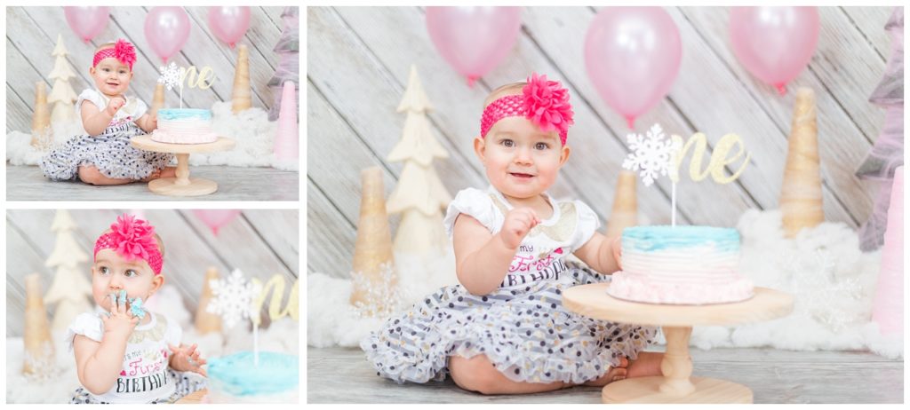 little girl eating a smash cake for a photo session