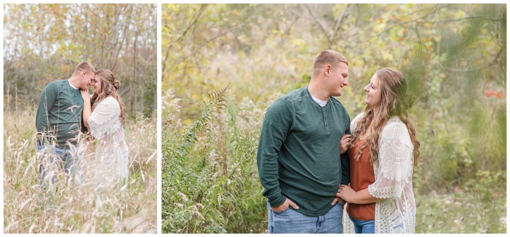 couple posing together in a field for couples photos