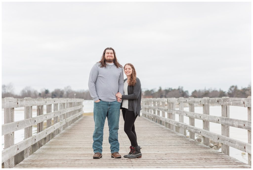 couple standing on a dock in Ohio and looking at the camera