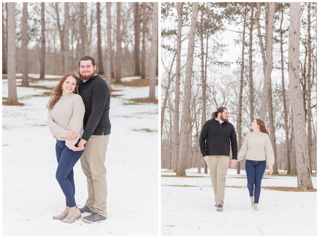 couple walking together in front of trees and snow in Ohio
