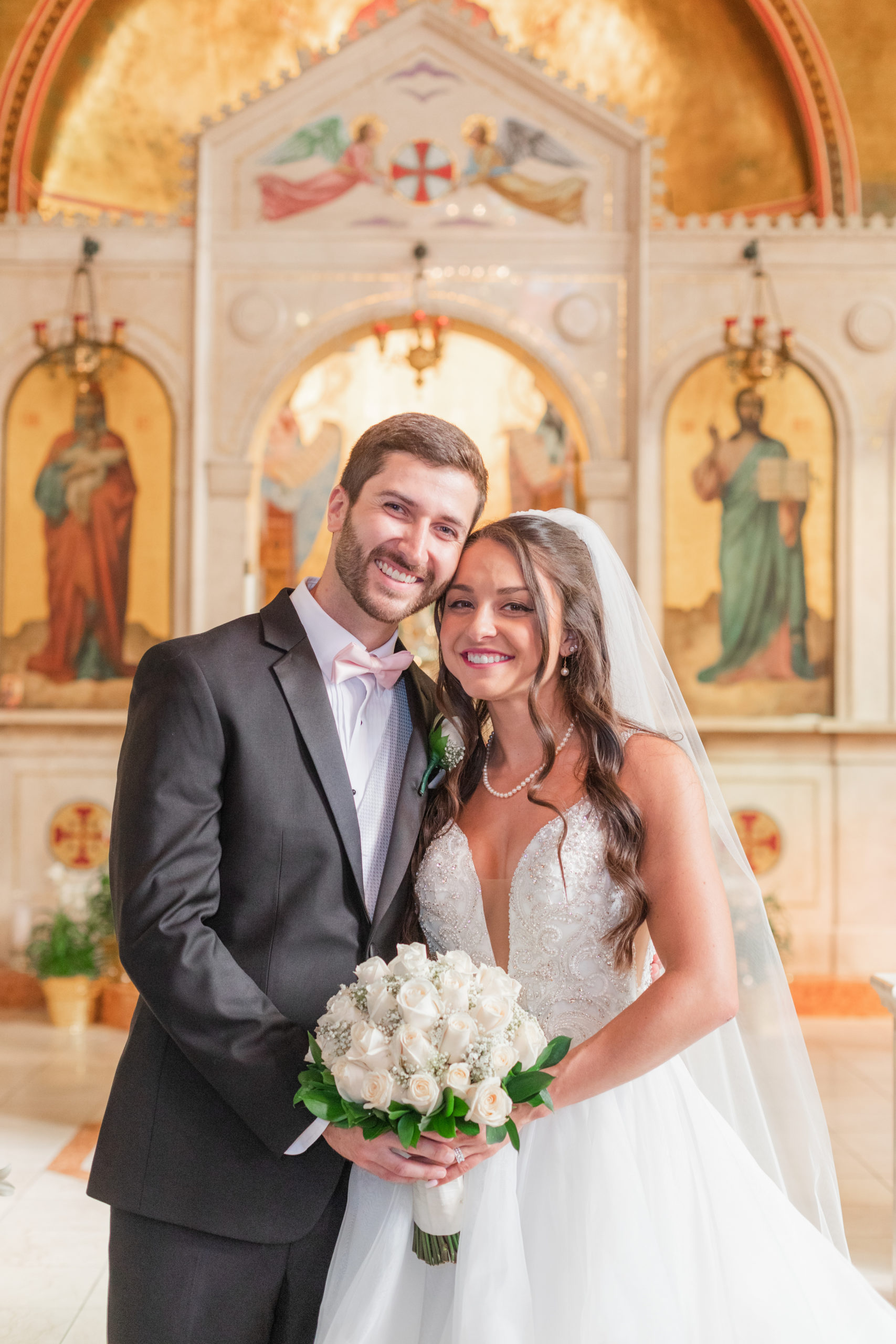 bride and groom together at greek othodox church wedding