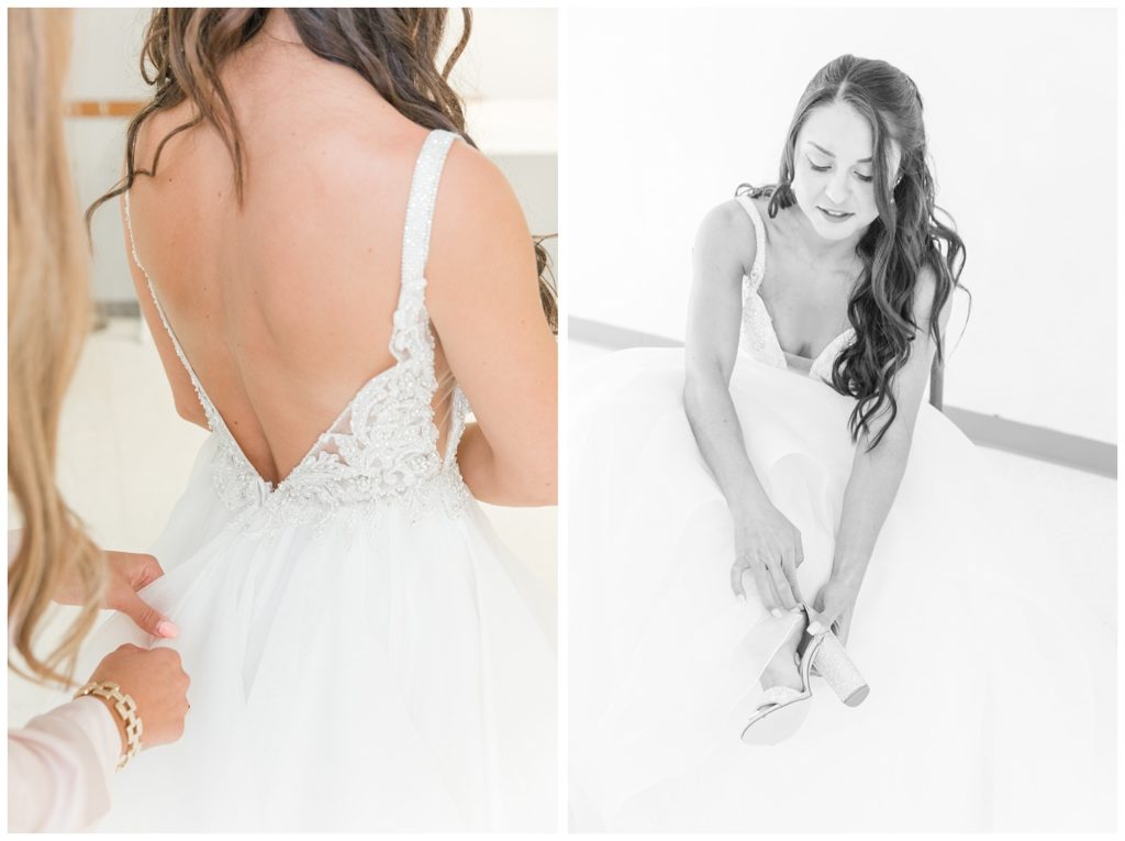 bride putting on her wedding shoes 