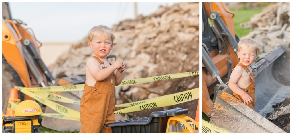 boy wearing overalls and posing next to a side loader in Ohio