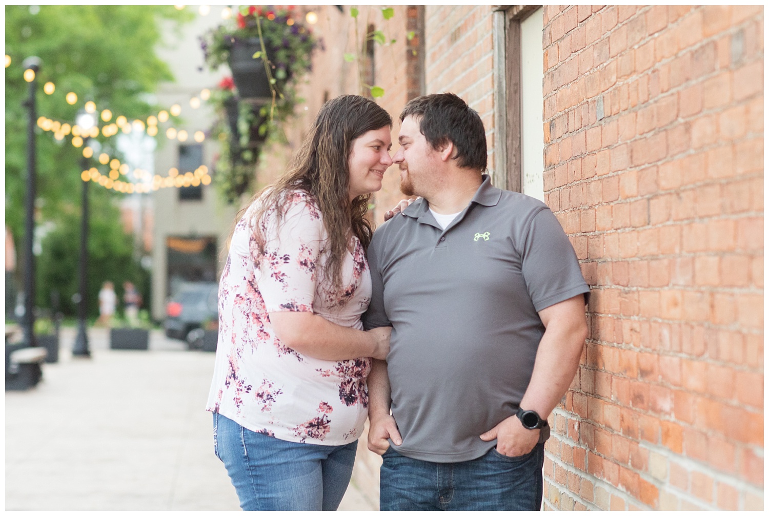 couple touching noses at engagement session