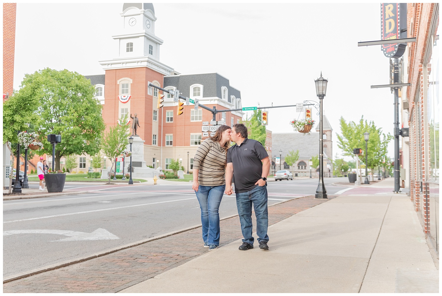 couple kissing in downtown Tiffin, Ohio