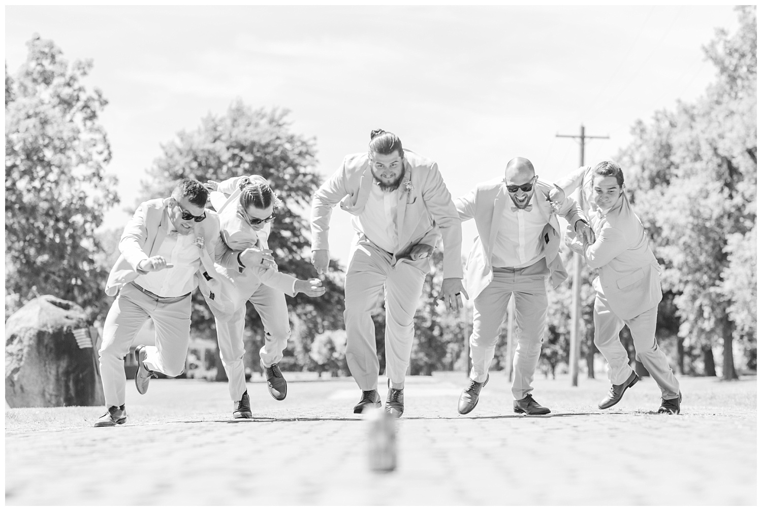 groomsmen racing for the beer