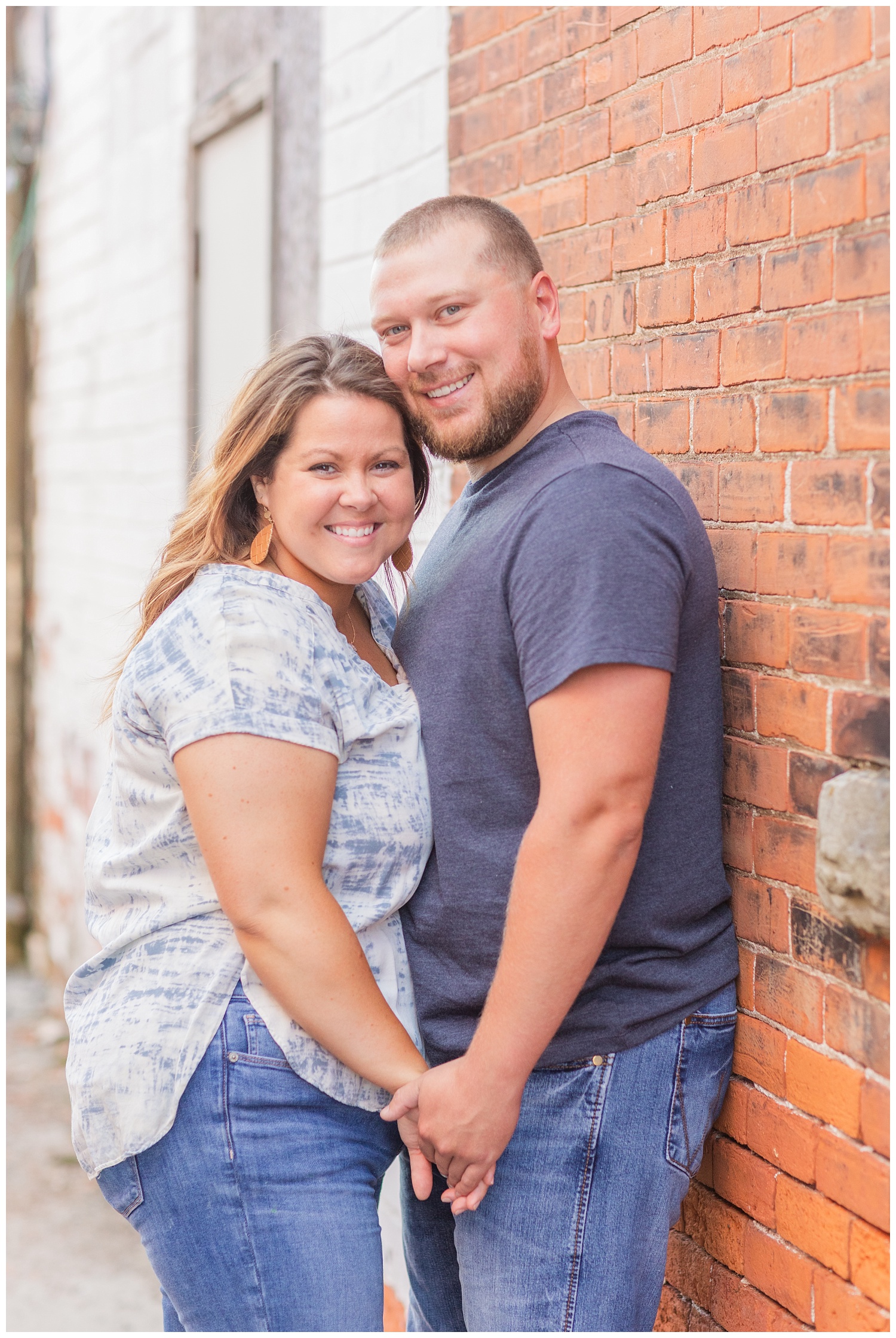 engaged couple holding hands during photo session in Ohio