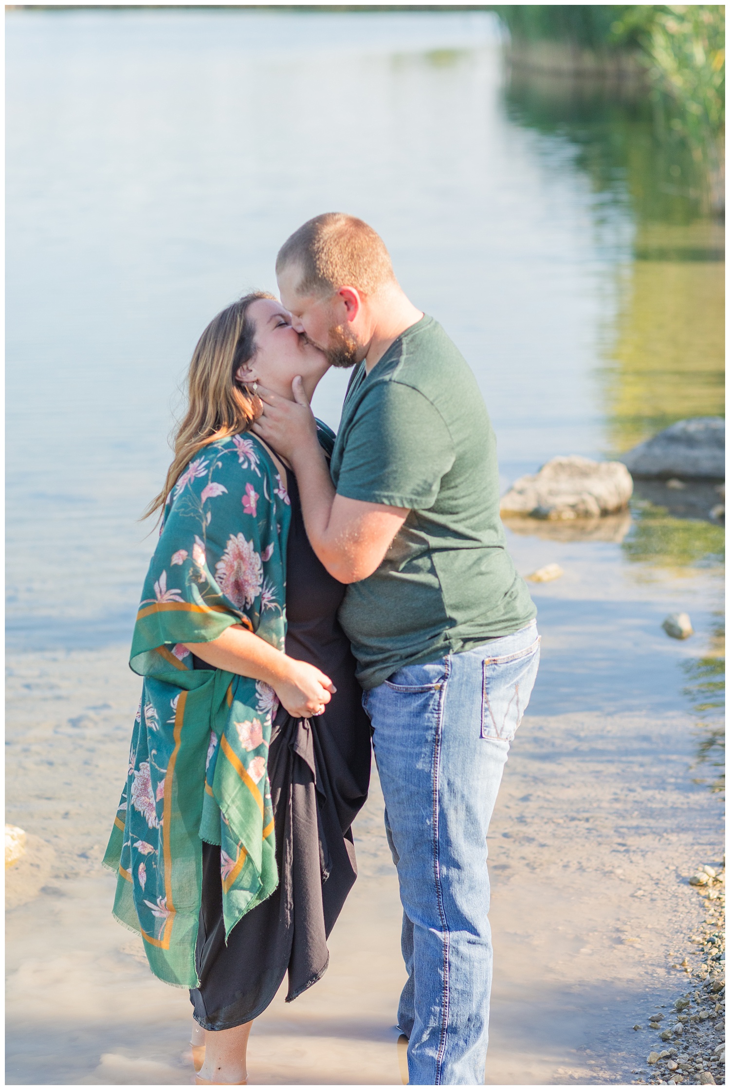 couple kissing while standing in the water at Silver Rock Quarry in Ohio