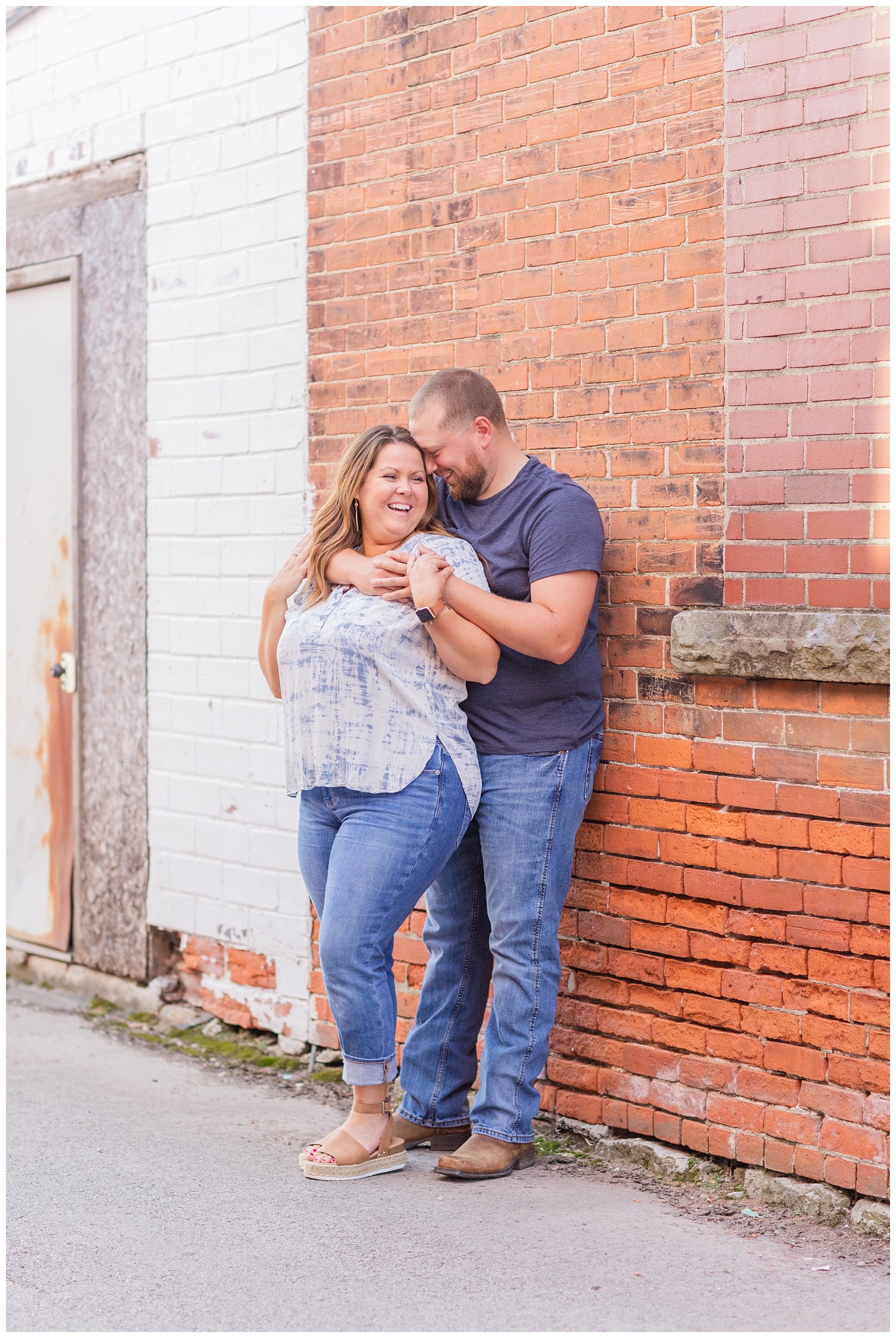 couple laughing during engagement session in Ohio