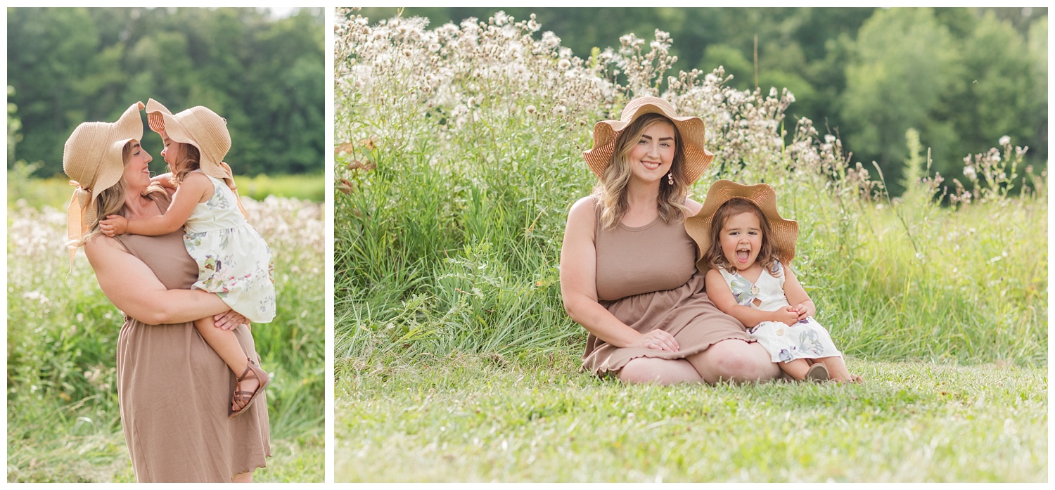 mom sitting with her three year old daughter in a field in Ohio