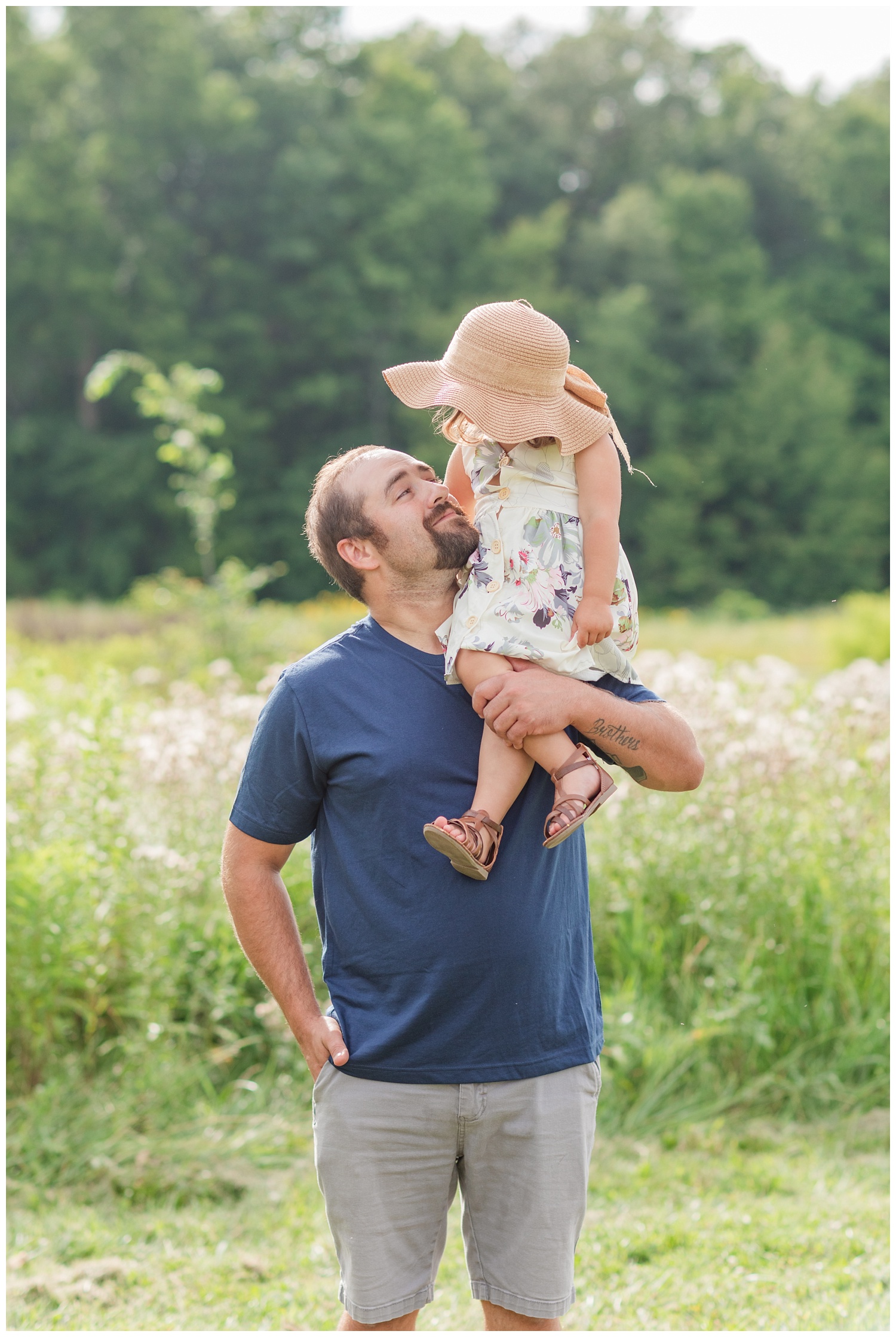 dad holding his daughter at 3rd birthday session in Ohio