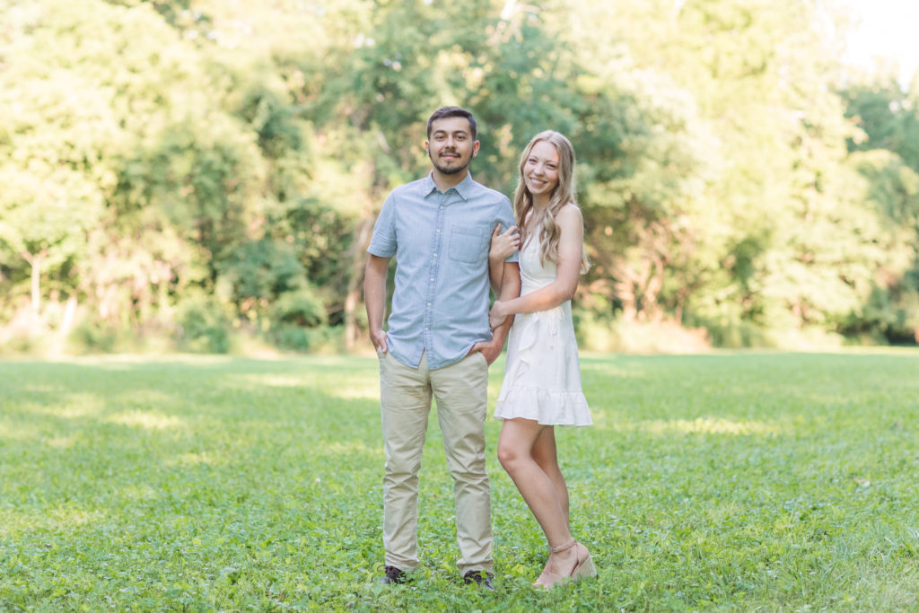 couple standing in a field for Ohio engagement photos