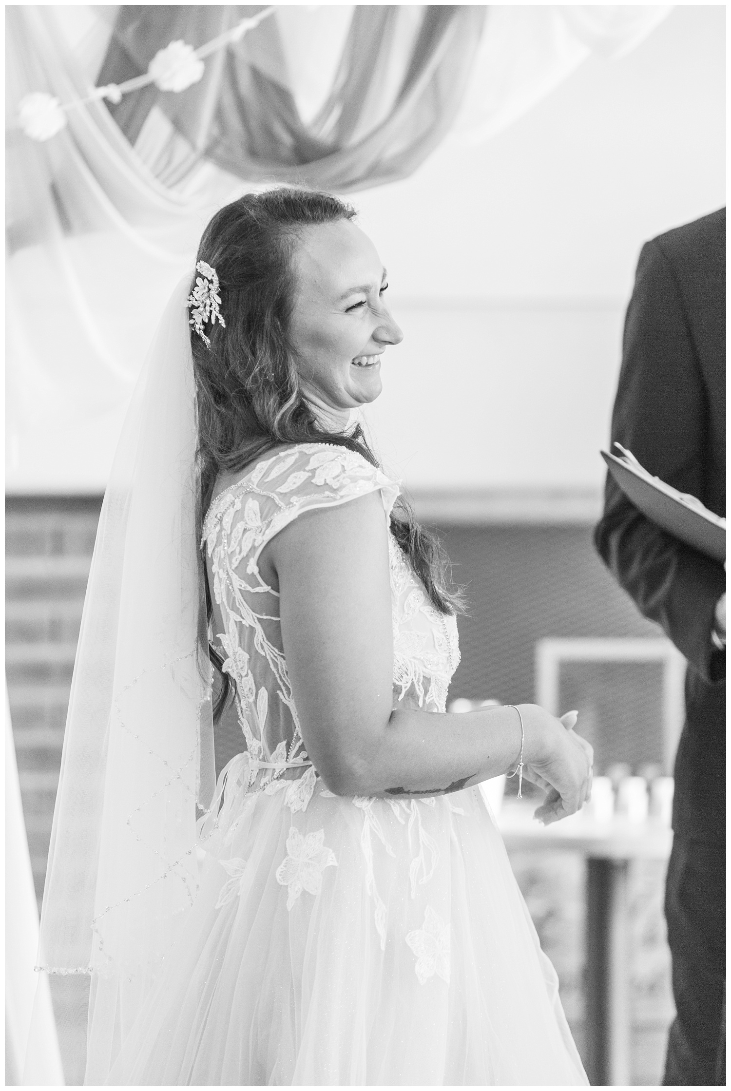 bride laughing during wedding ceremony in Ohio