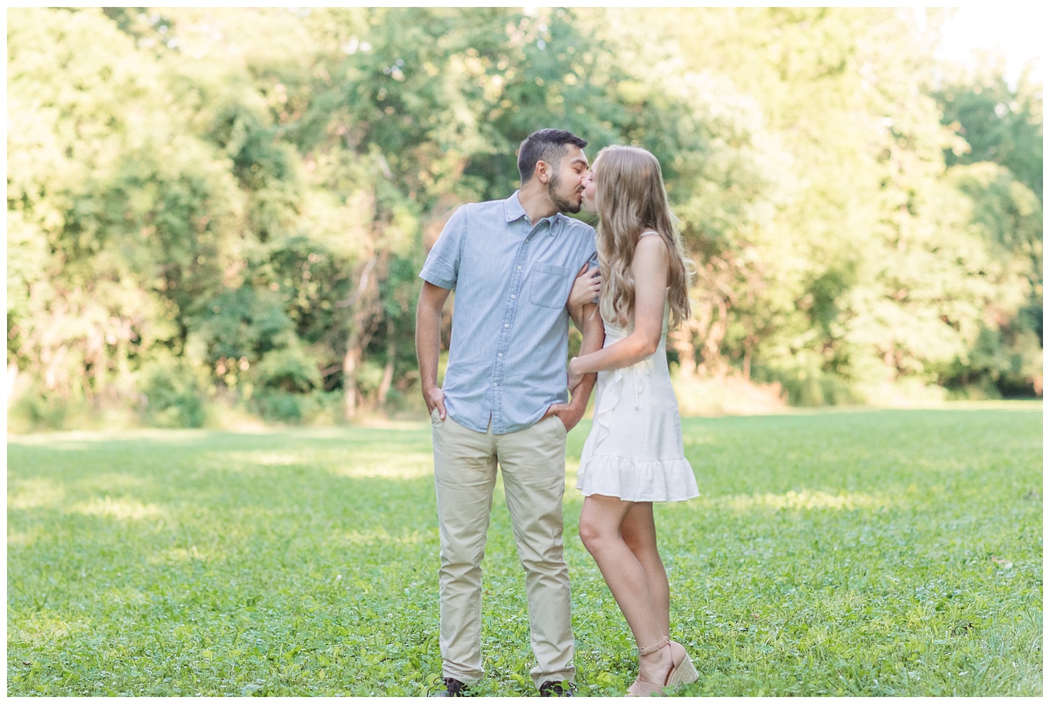 couple kissing at engagement session in Green Springs