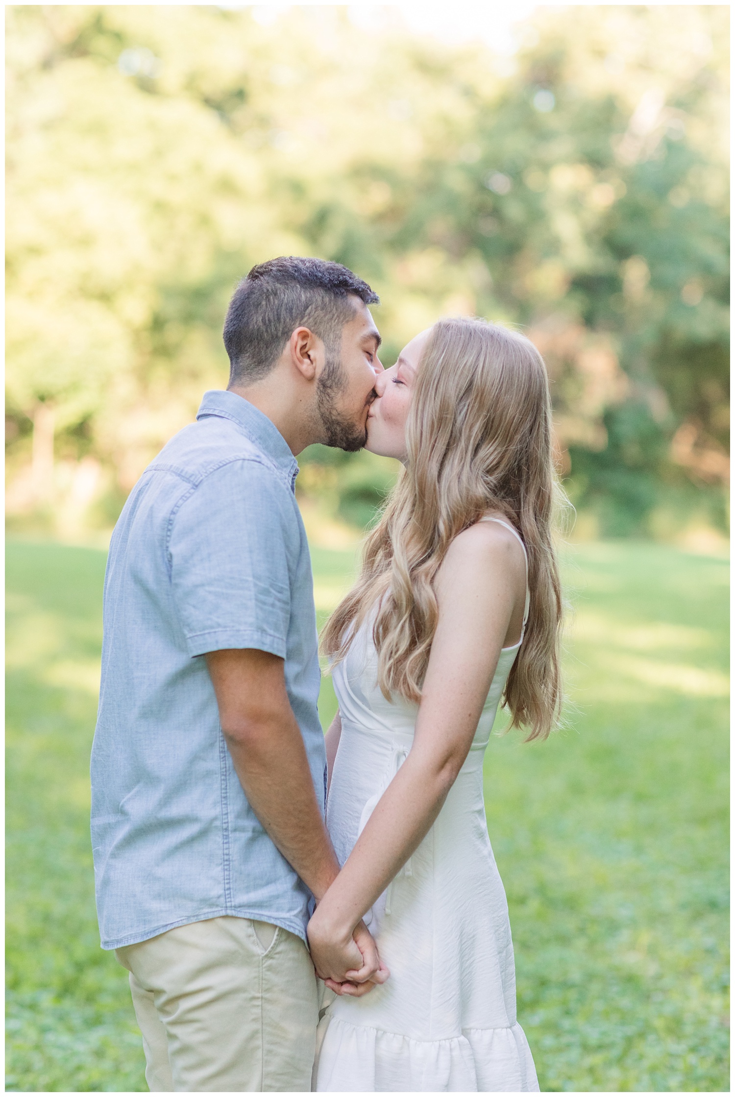couple kissing at engagement session in Green Springs, Ohio