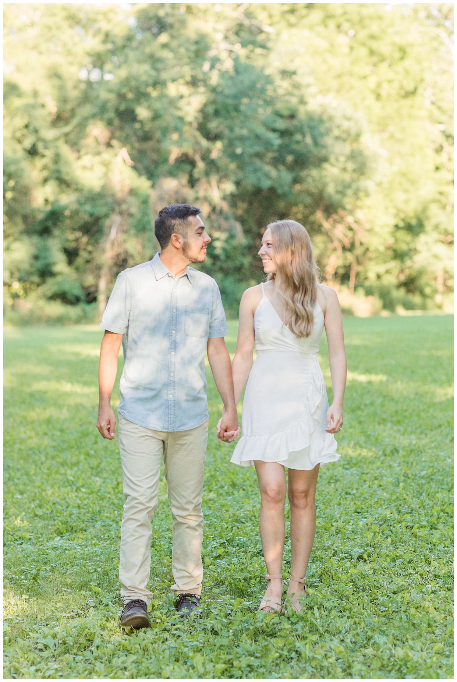 engaged couple walking together in Green Springs, Ohio