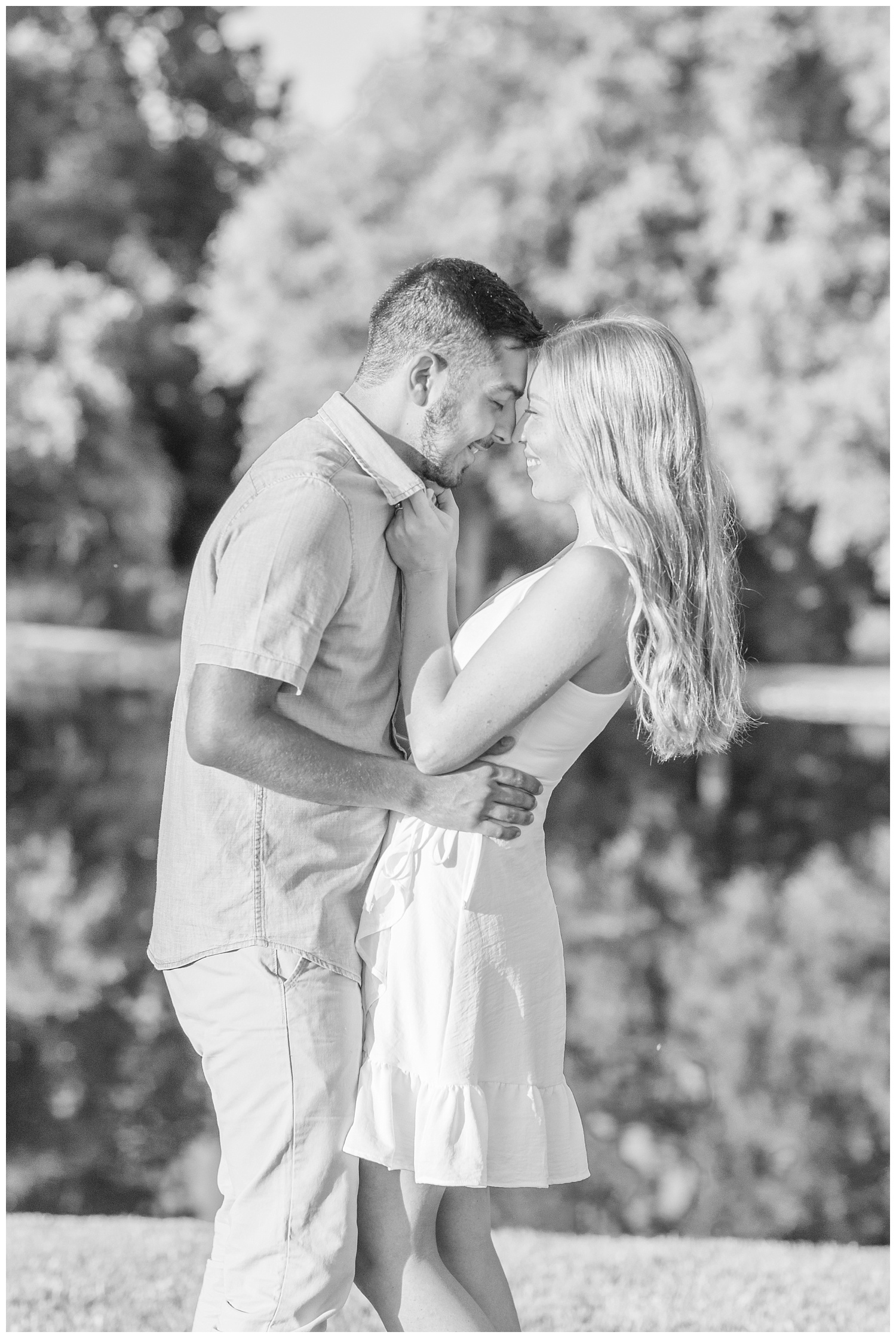 couple touching foreheads and noses at engagement session in Green Springs, Ohio