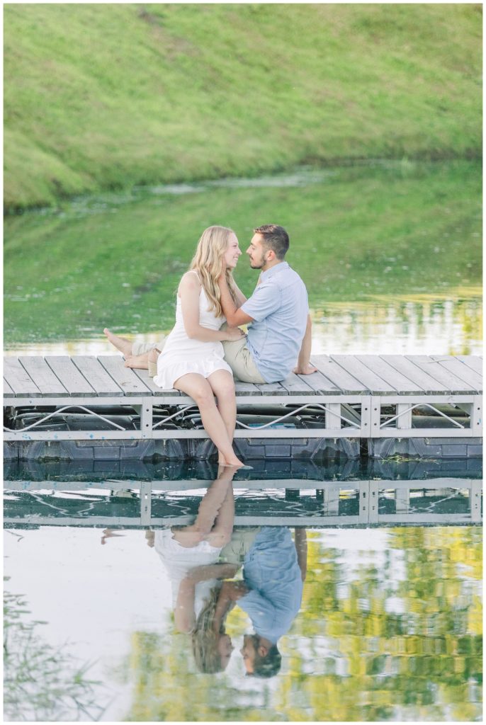 couple sitting together on a dock in Green Springs, Ohio