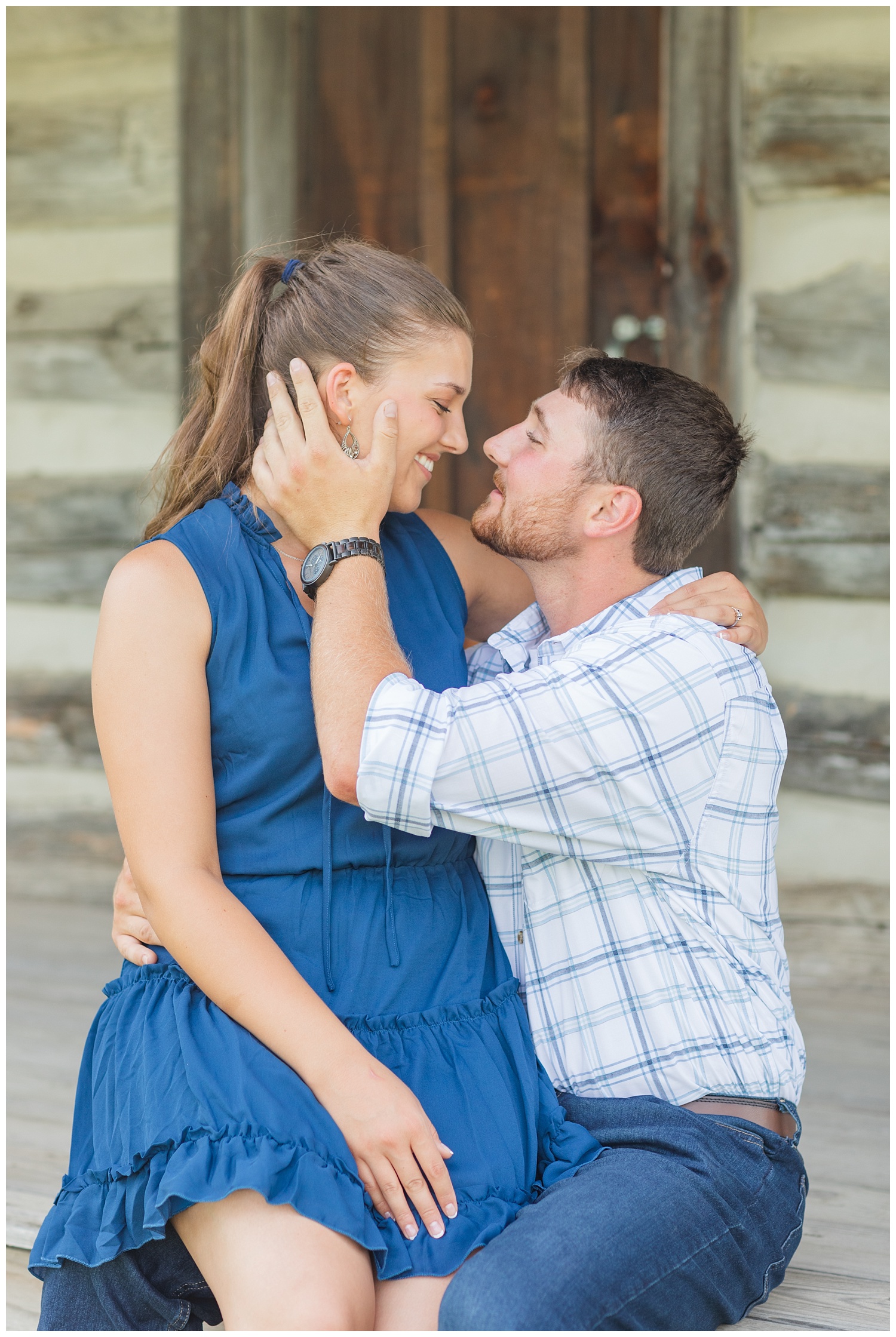 couple sitting on steps at Gibsonburg engagement session