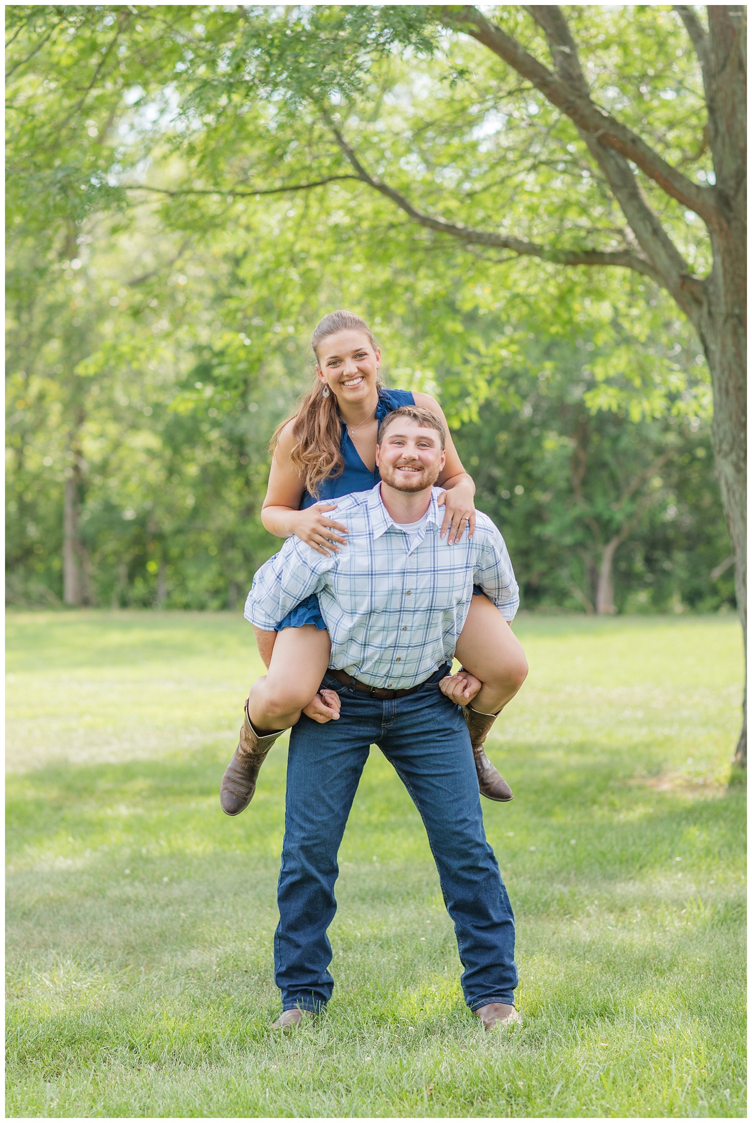 couple piggy backing together at White Star Park engagement session