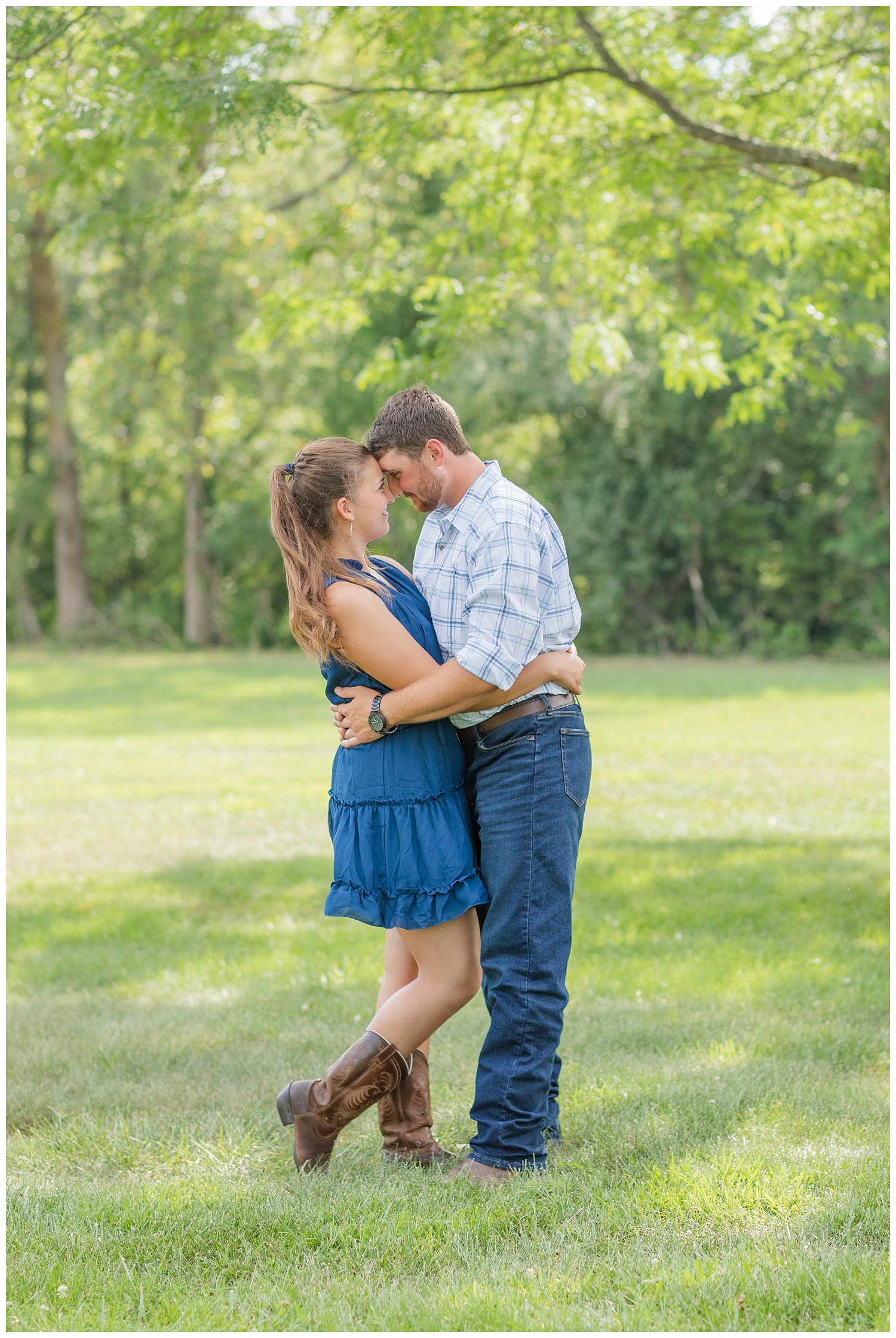 couple standing in a field for Ohio engagement session
