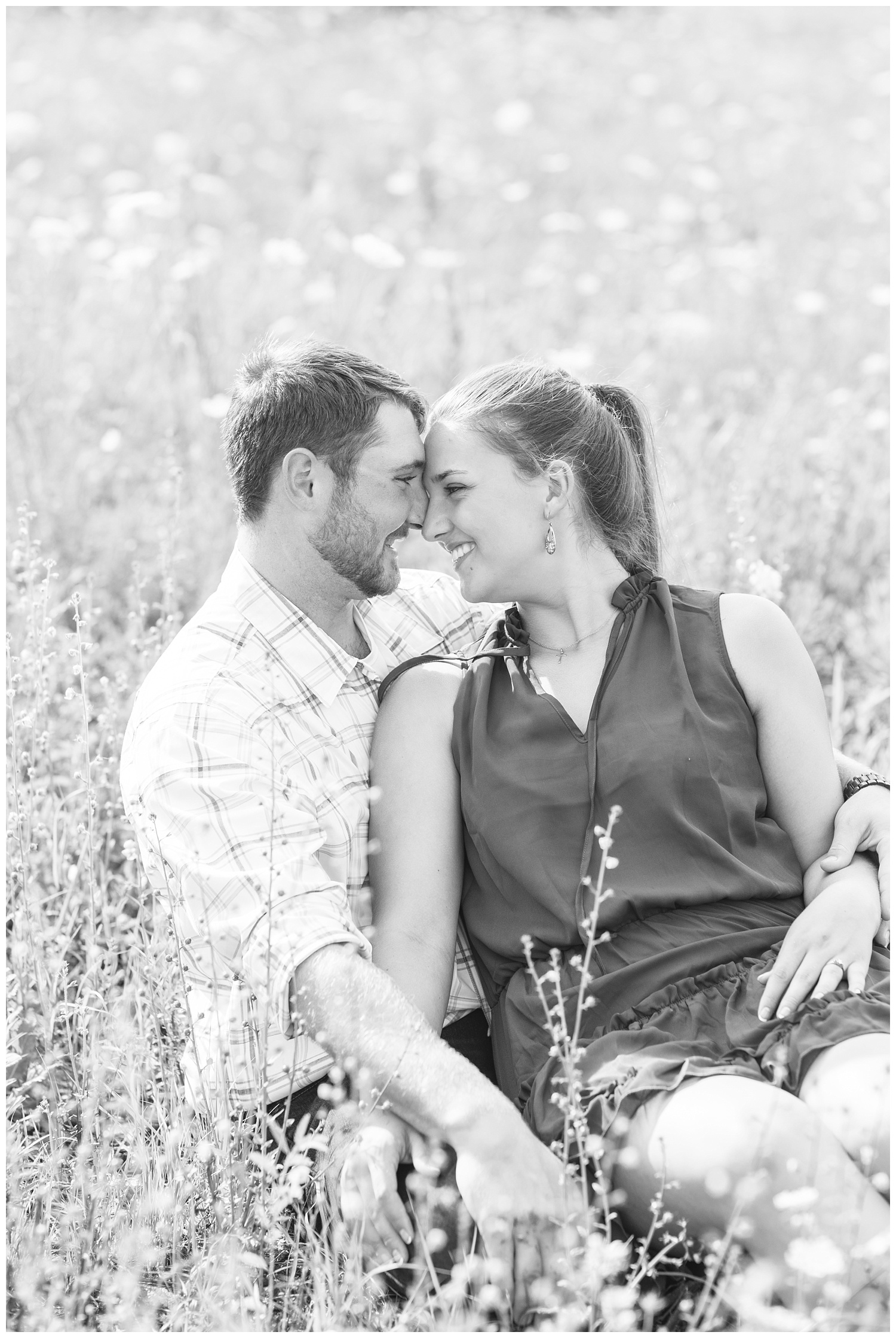 couple looking at each other in a field in Gibsonburg, Ohio