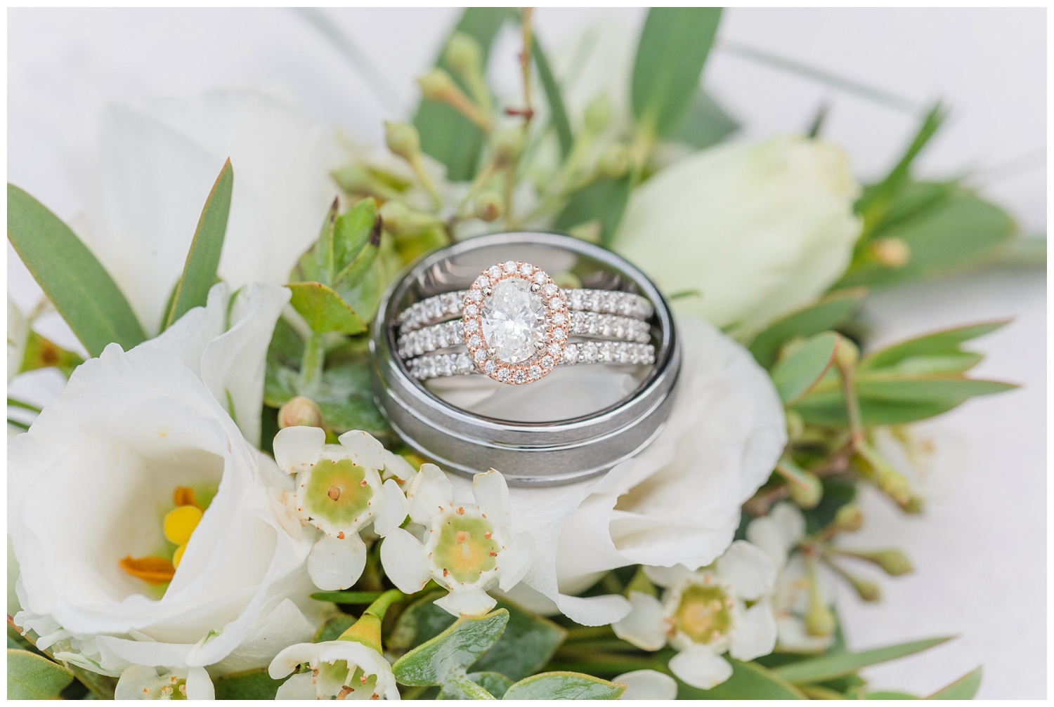 wedding rings sitting on flowers in Fremont, Ohio