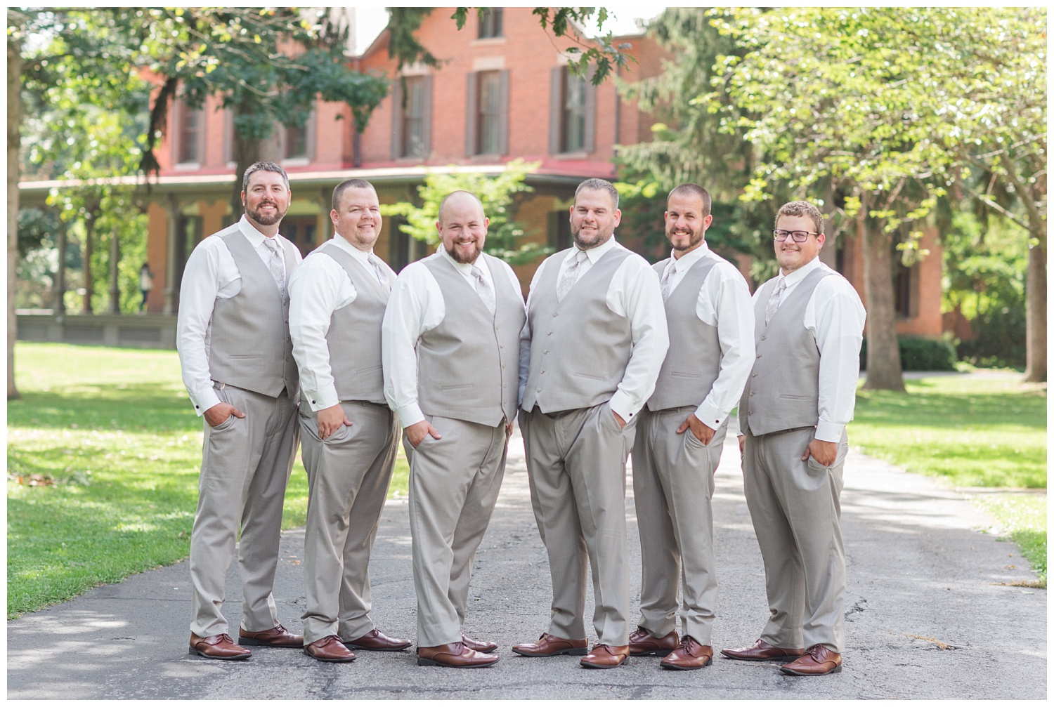groomsmen posing together at the Hayes Center