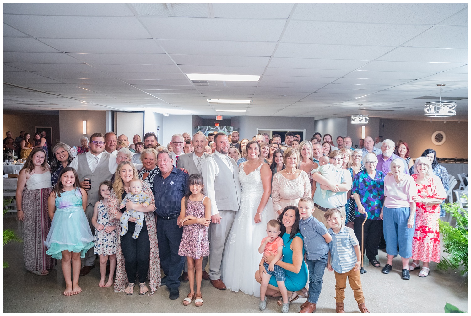 photo of all the wedding guests at the Victors Event Center in Fremont, Ohio