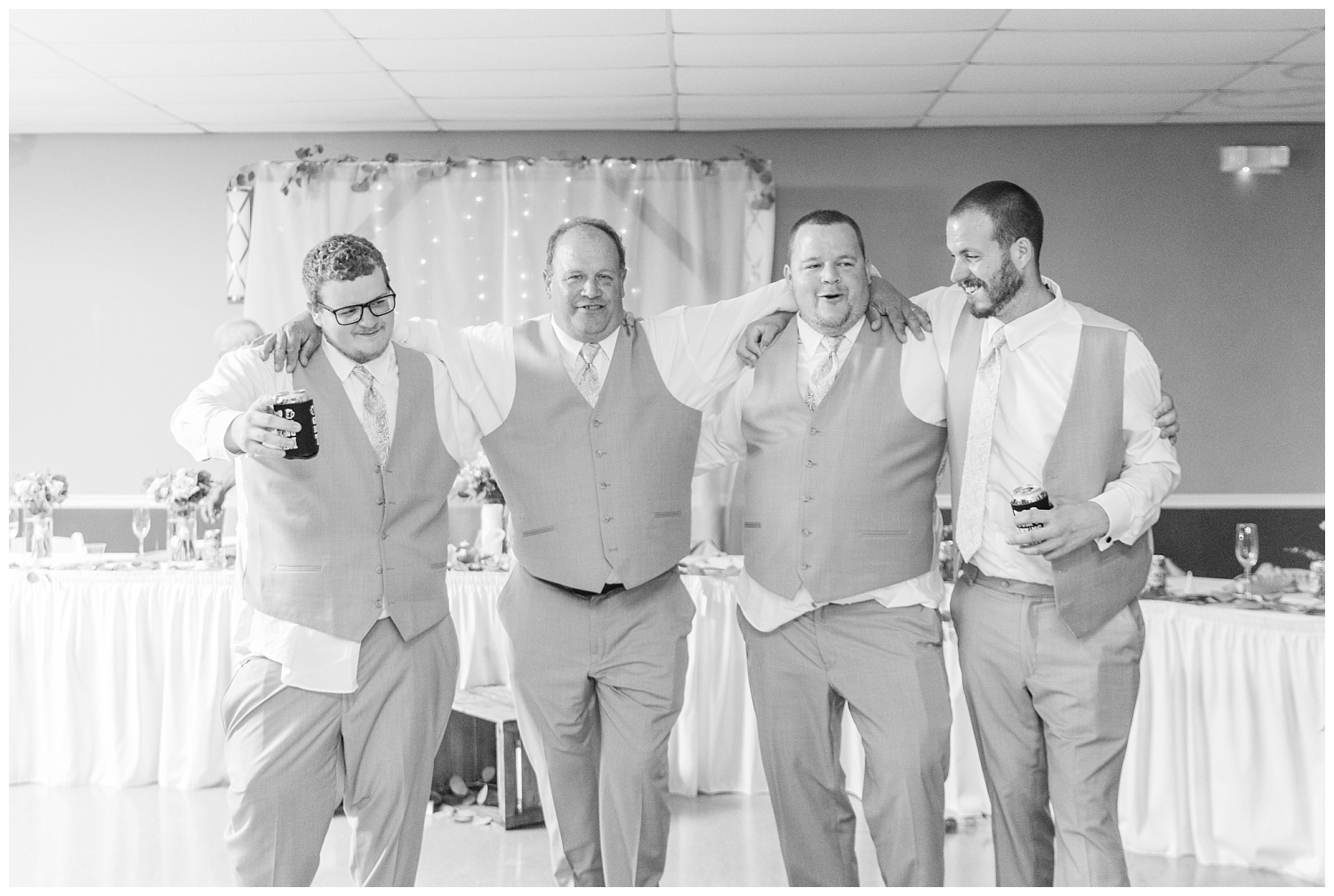 groomsmen posing at wedding reception at the Victors Event Center