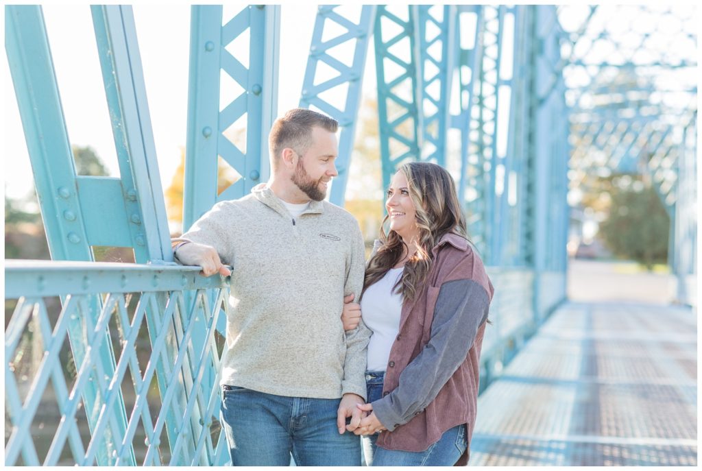 couple standing on the Tindall Bridge in Fremont, Ohio