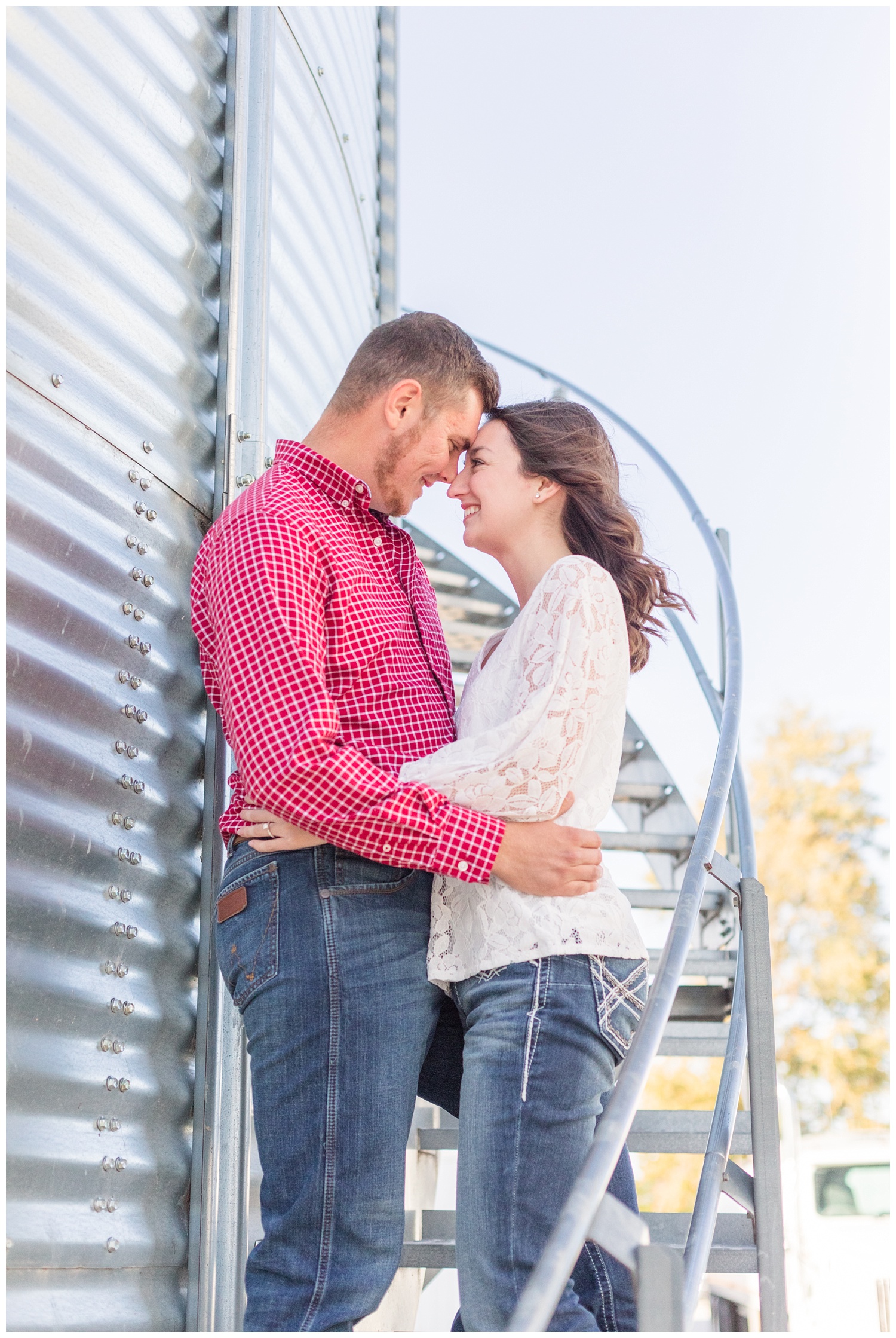 couple standing on the stairs of a silo in Ohio