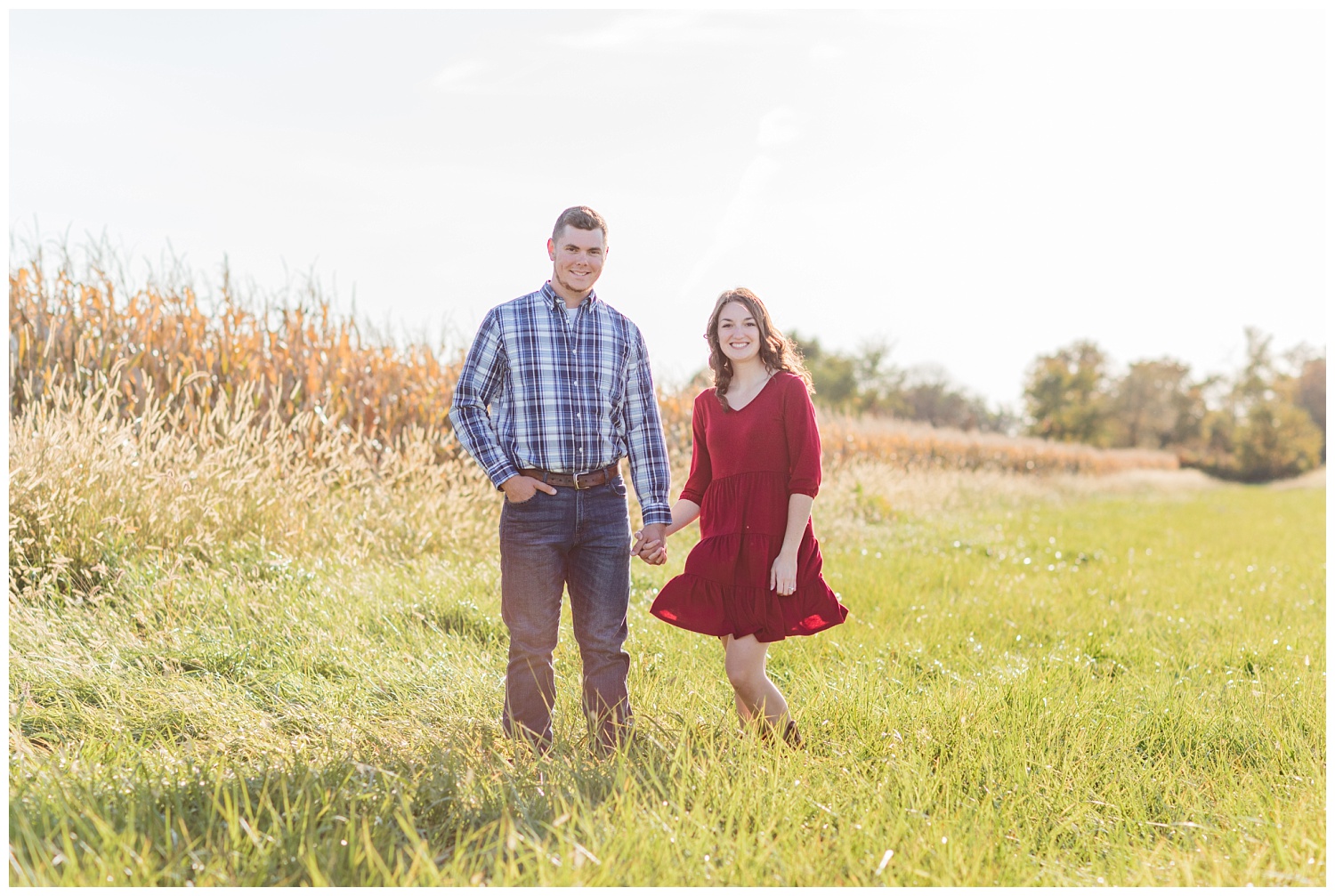 engaged couple standing in a corn field in Vanlue, Ohio