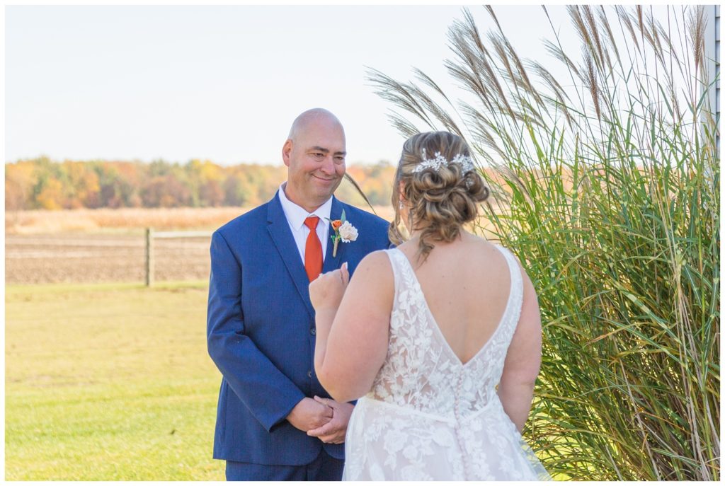 bride and dad having first look before wedding in Fostoria, Ohio