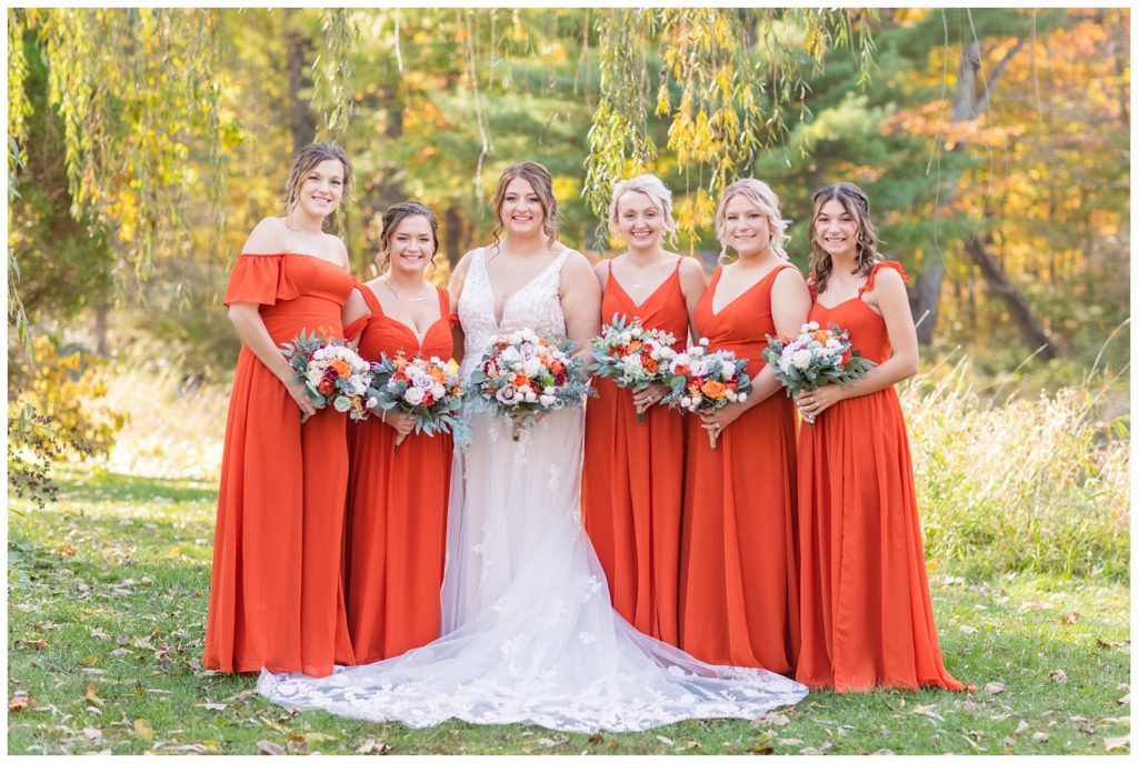 bride and bridesmaids in a field in Ohio