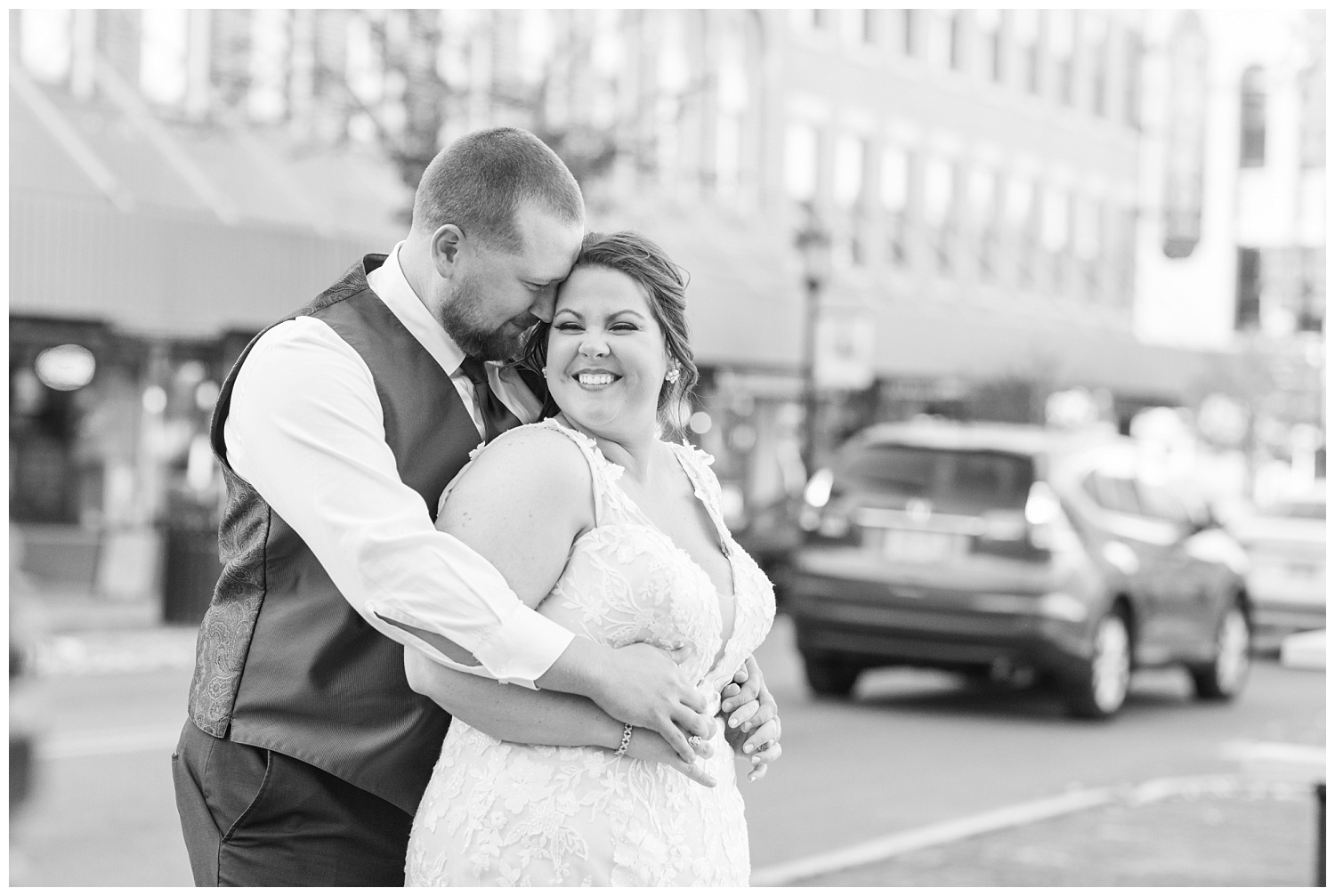 bride and groom standing in downtown Gibsonburg