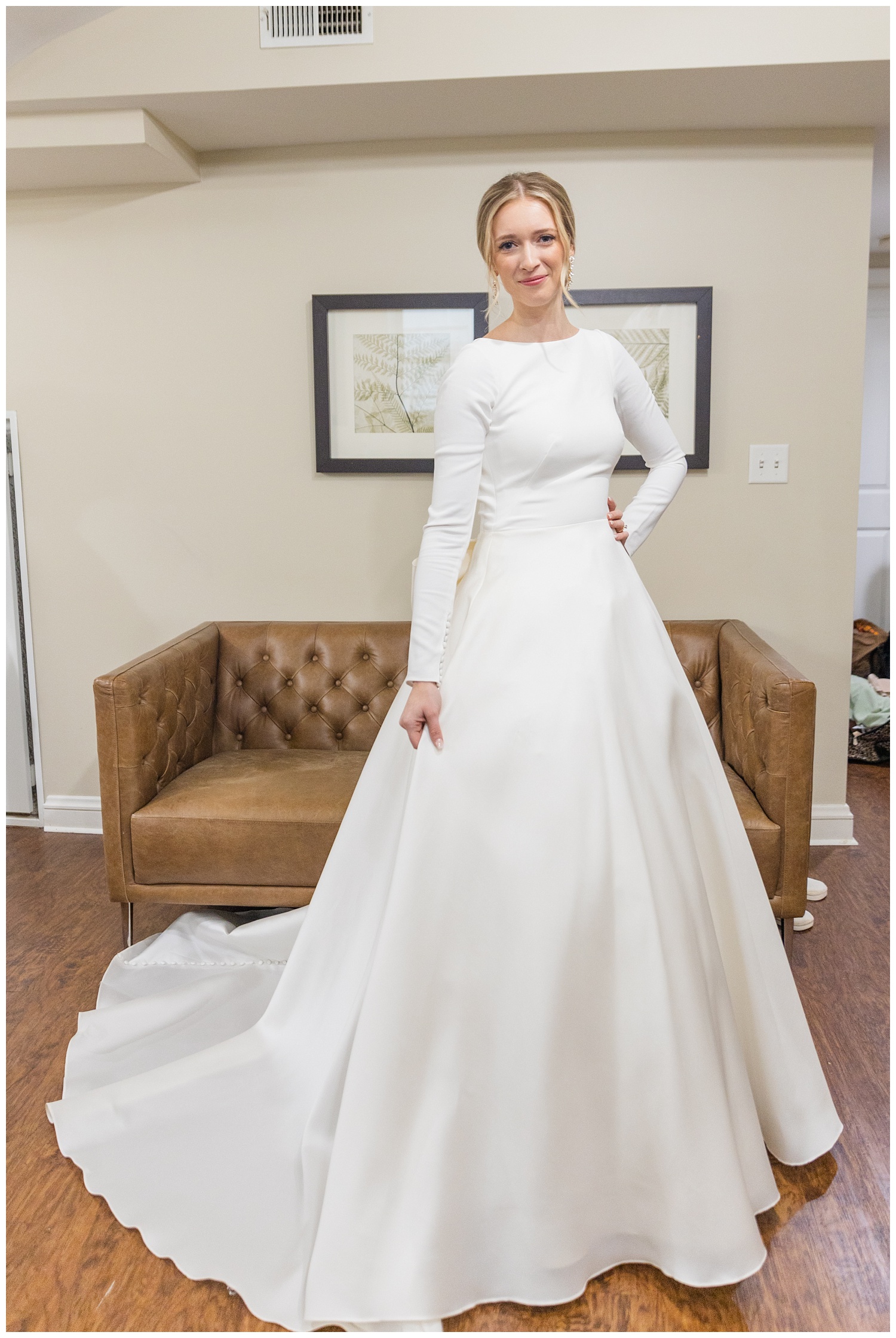 full length photo of the bride in her dress before the wedding