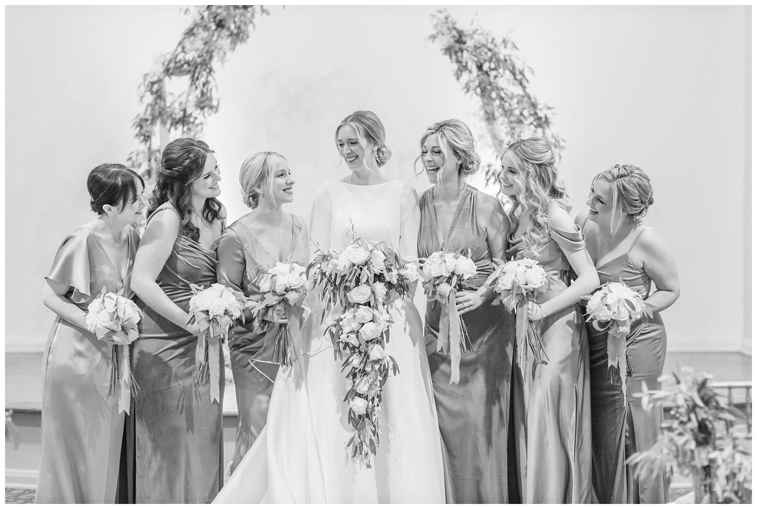 bride and bridal party laughing at the ceremony site in Columbus, Ohio