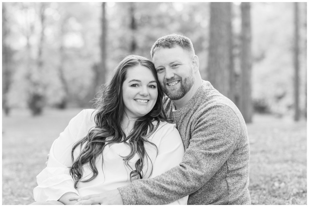couple sitting together for their engagement session in northwest Ohio
