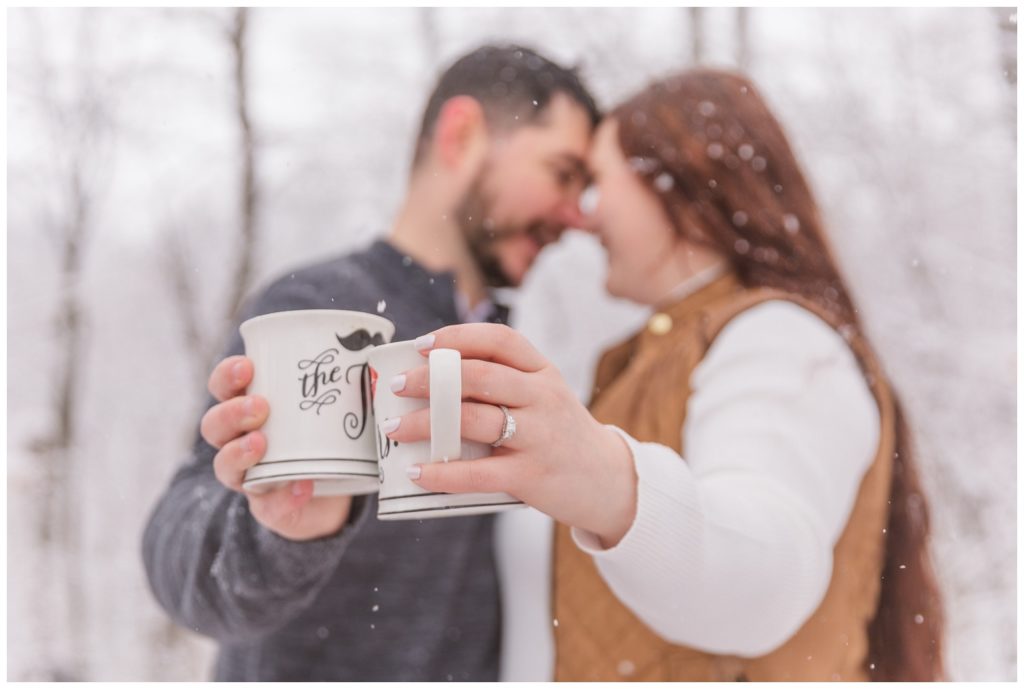 close up of coffee mugs at Ohio winter engagement session