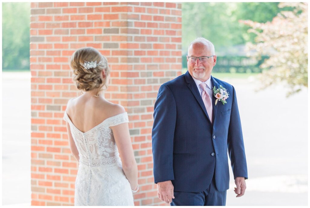 first look with bride and dad at Grace Community Church in Tiffin, Ohio