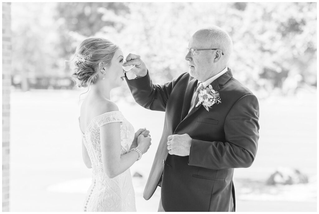 first look with bride and dad at Grace Community Church in Tiffin, Ohio