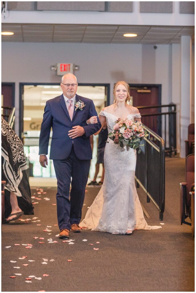 dad walking the bride down the aisle at Tiffin Ohio summer wedding