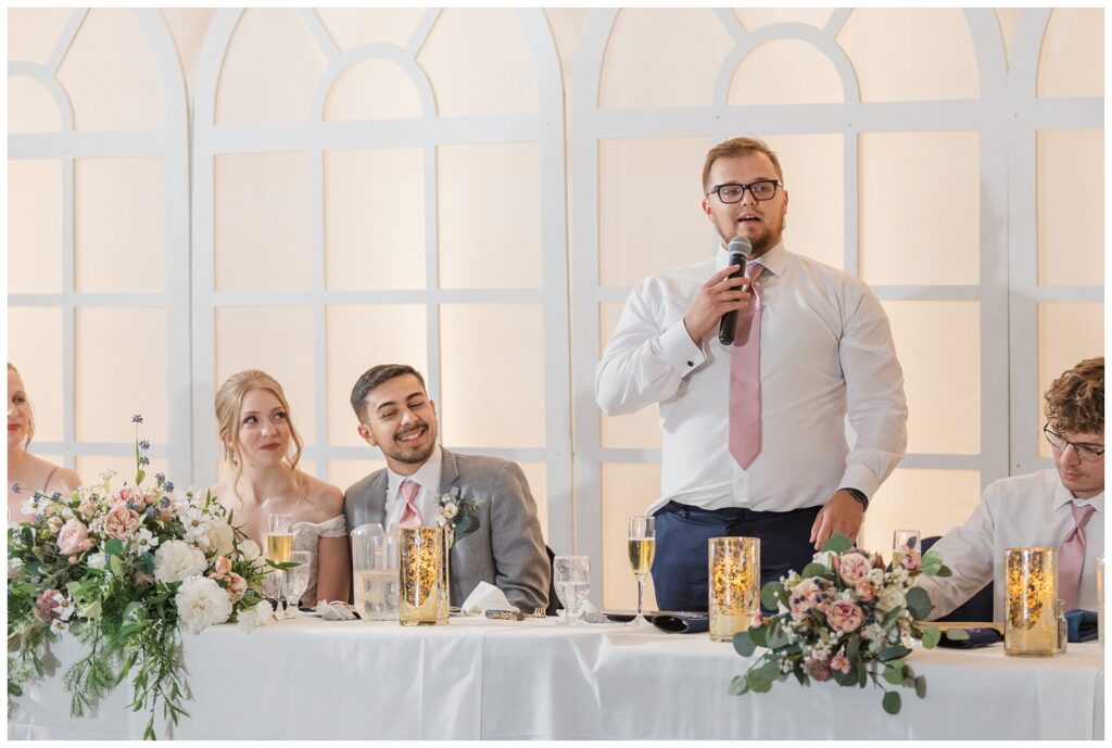 groomsman giving a toast at summer wedding reception in Tiffin, Ohio