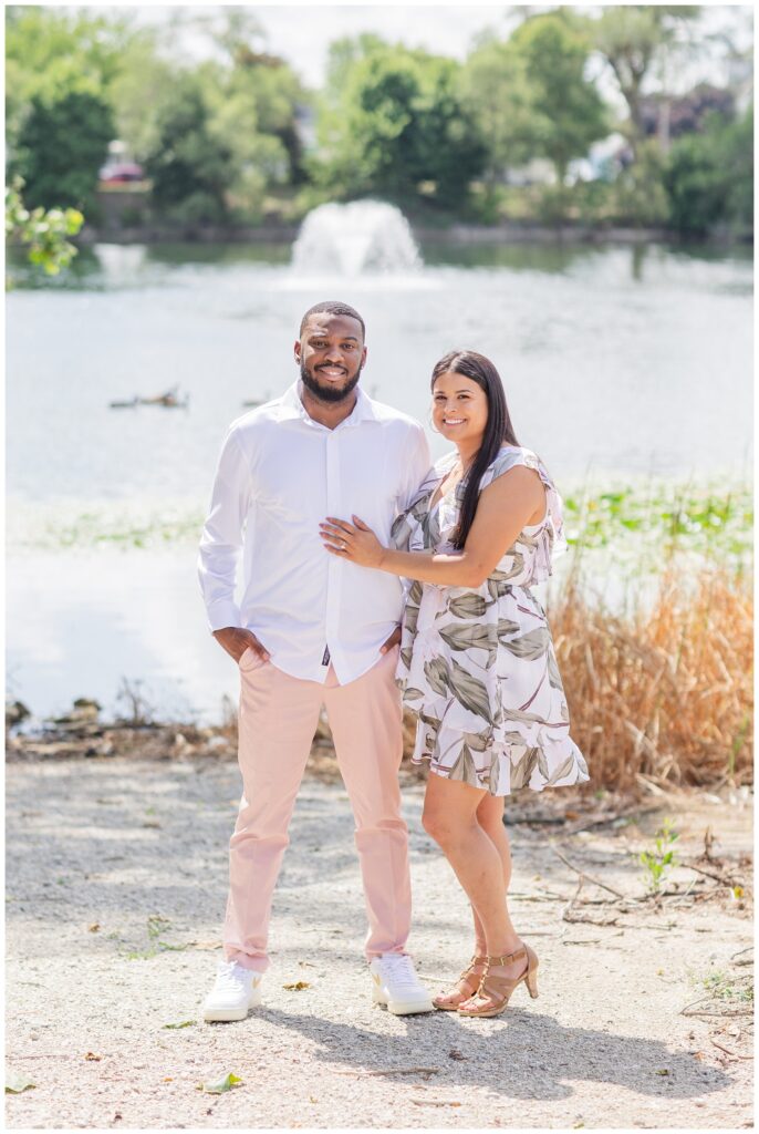 couple smiling at engagement session at Williams Park