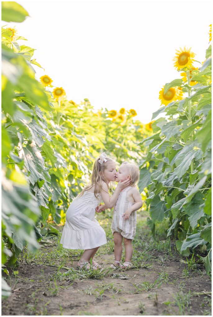 two sisters standing in a sunflower field in northwest Ohio