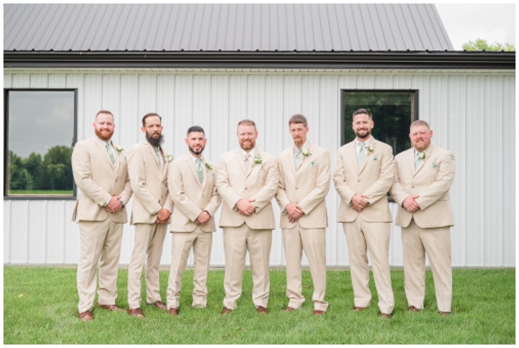 groomsmen portraits in front of a Monroeville, Ohio wedding venue