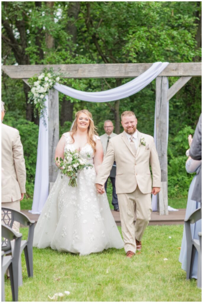 bride and groom walking back down the aisle at wedding ceremony in Ohio