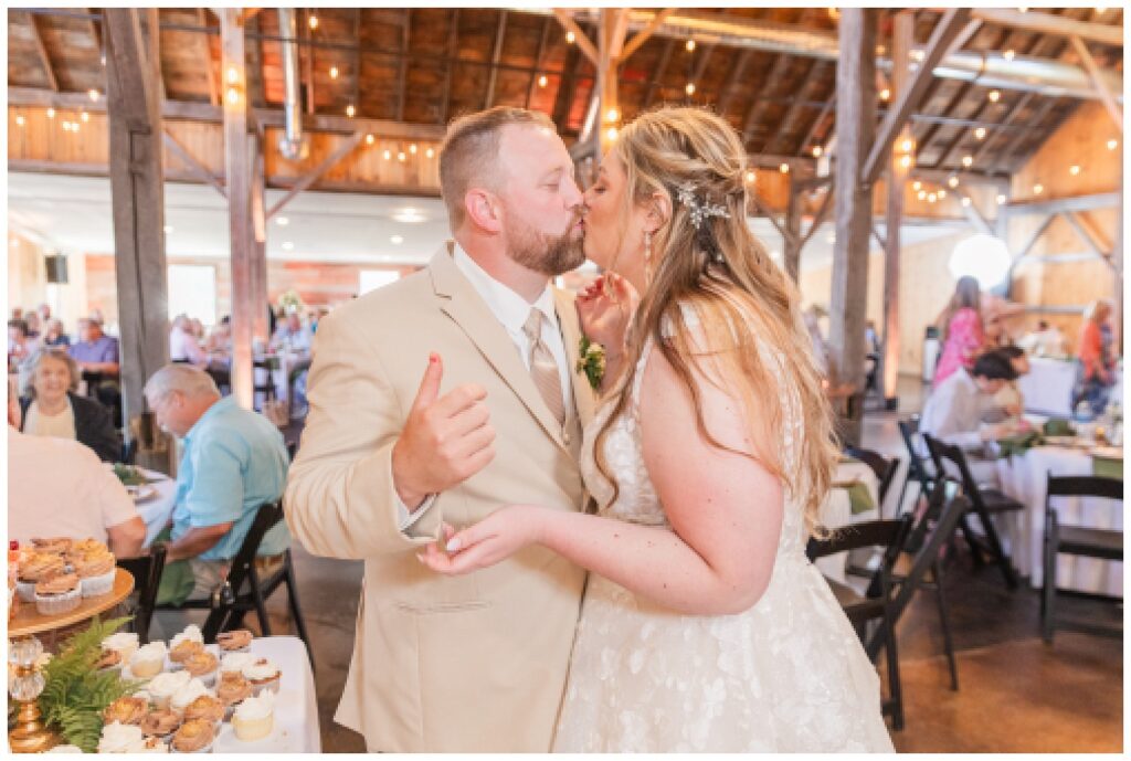 wedding couple kissing at reception in Monroeville, Ohio