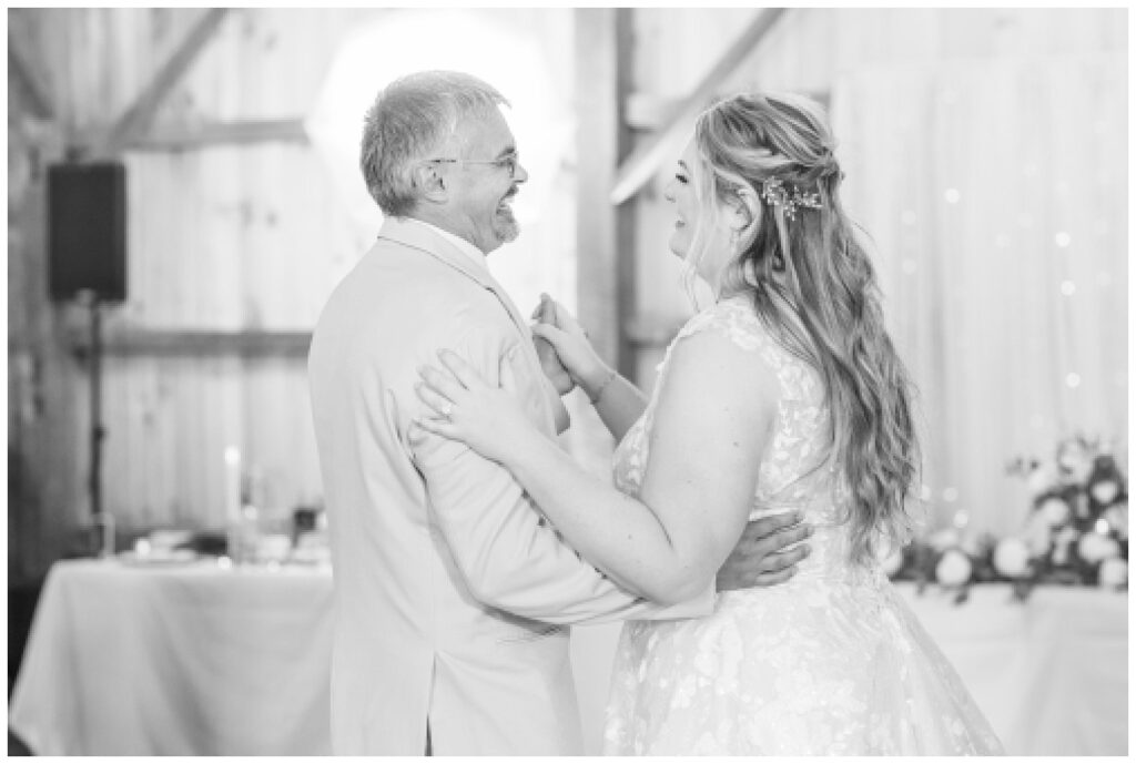 bride dancing with her stepdad at Monroeville, Ohio wedding venue